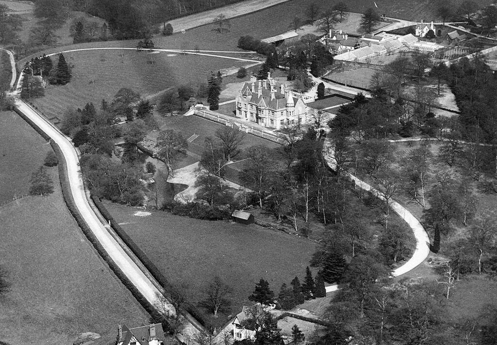 Aerial view of Foxbury estate showing the main house, farm buildings, and lodges, 1920s